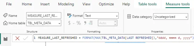 Screenshot of a new measure containing the formatted last refreshed timestamp in Power BI.